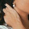 pendientes con perlas circulares y estrellas hematites