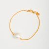 Pulsera con perla y cadena de plata con baño de oro