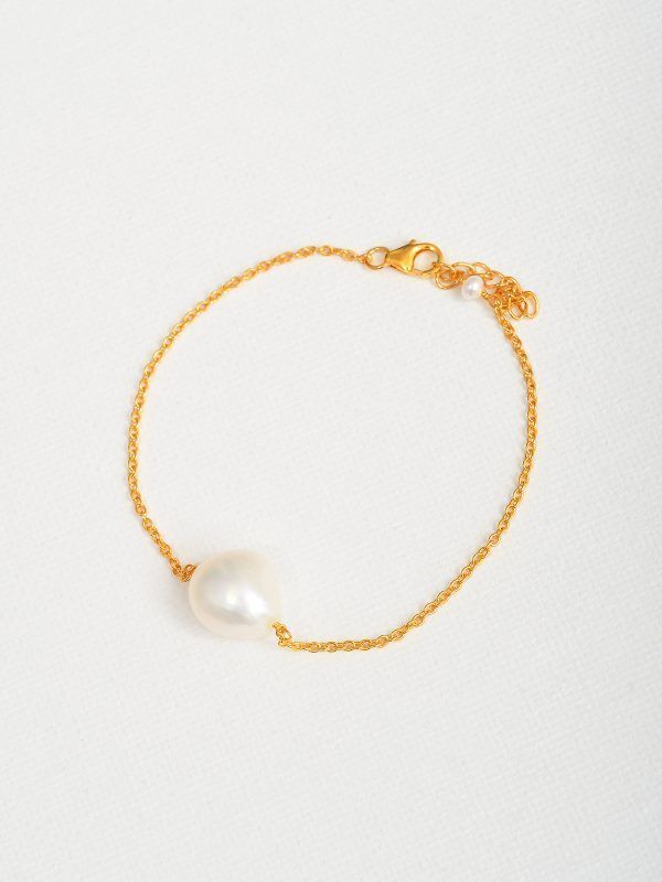 Pulsera con perla y cadena de plata con baño de oro